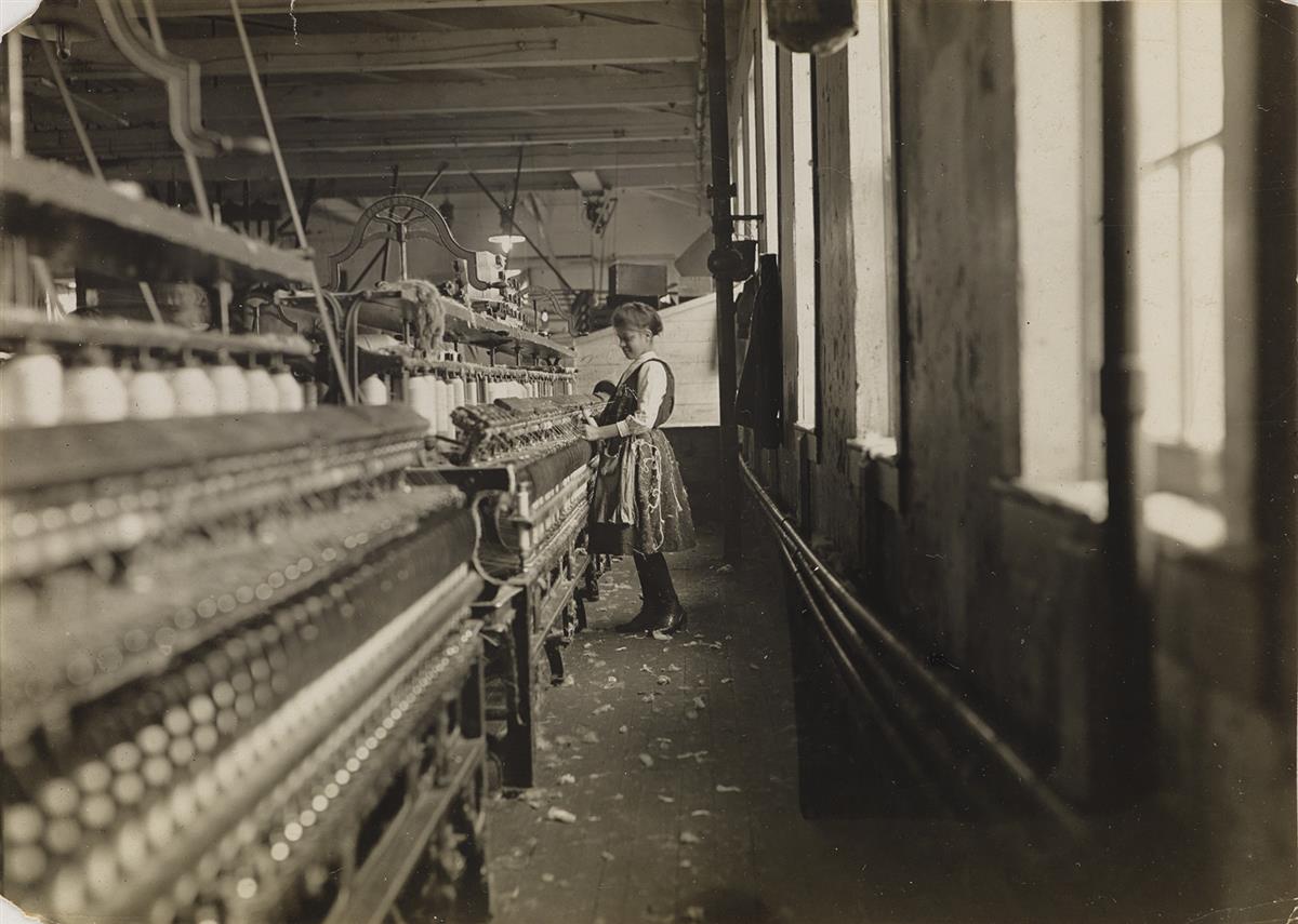 LEWIS W. HINE (1874-1940) This little spinner has been in the mill 4 years.